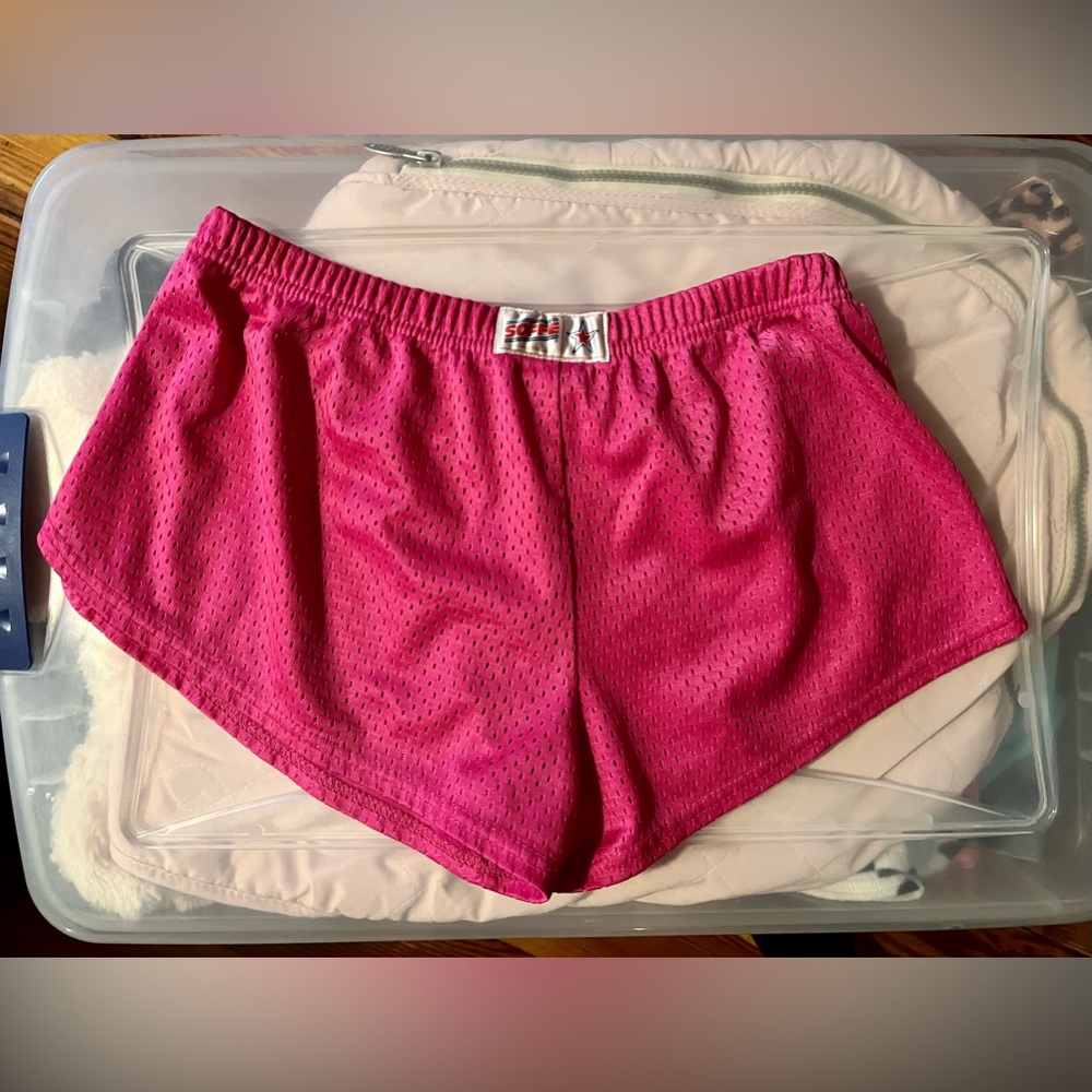 Size medium soffe cheer shorts, pink . Great condition.